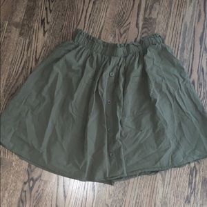 Military green skirt with front pockets